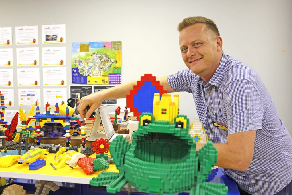 Man with lego bricks